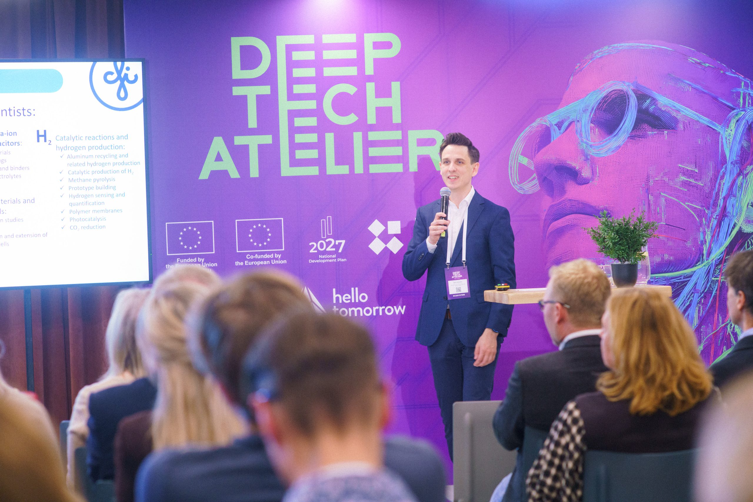 Speaker presenting at Deep Tech Atelier in Riga